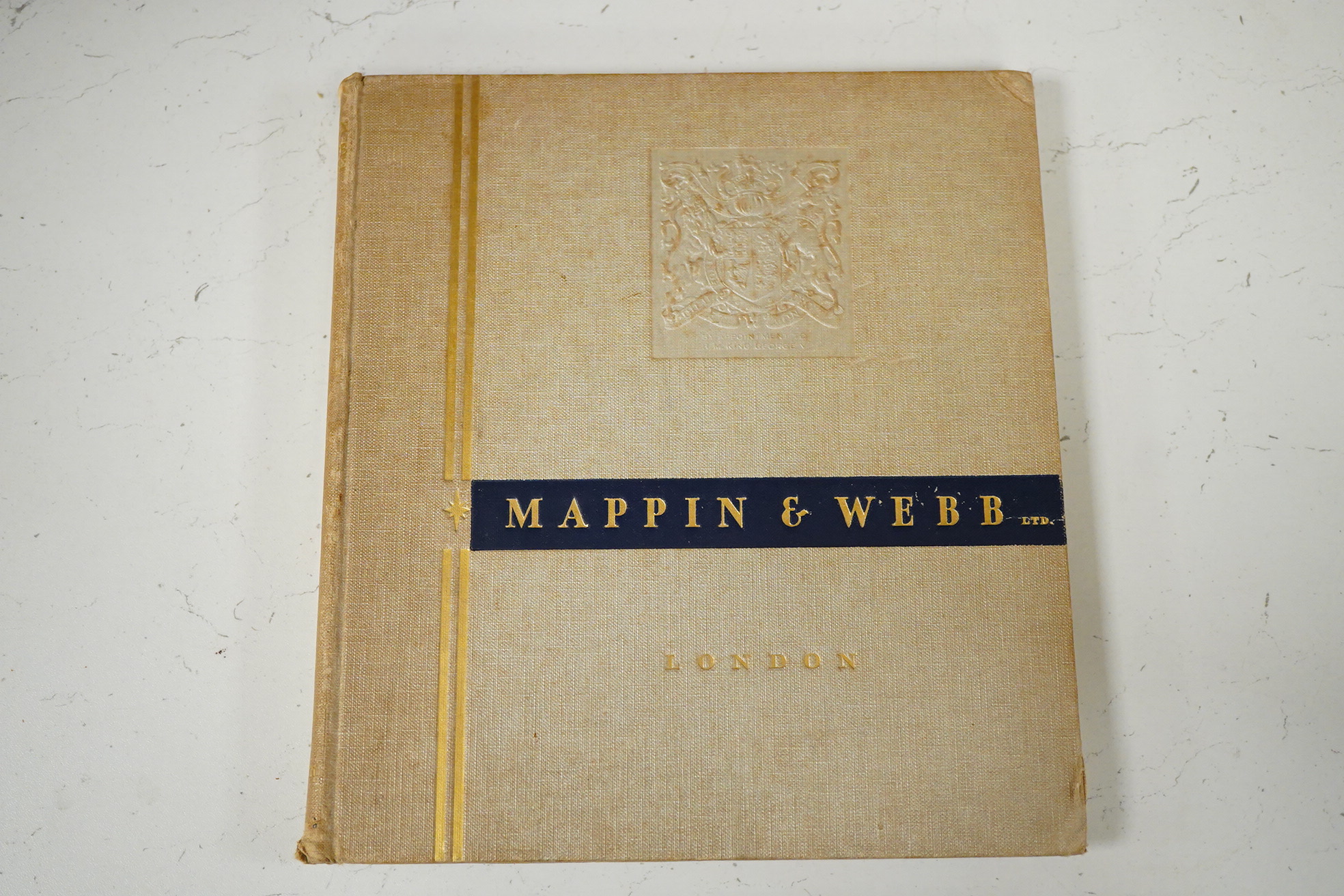 Mappin & Webb Ltd. [Catalogue]. illus. throughout (a little in colour), coloured pictorial e/ps.; original gilt cloth, 4to. (?1935); Asprey and Company Limited ... [Catalogue]. illus. throughout (num. coloured); original